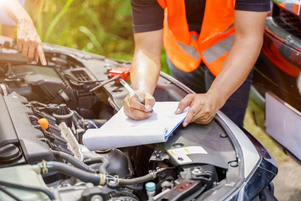 VA Safety Inspections (1) Mechanic car service auto garage in automotive mobile center. Technician workshop repair engine motor vehicles service mechanical engineering business. Automobile mechanic hands car repairs technic